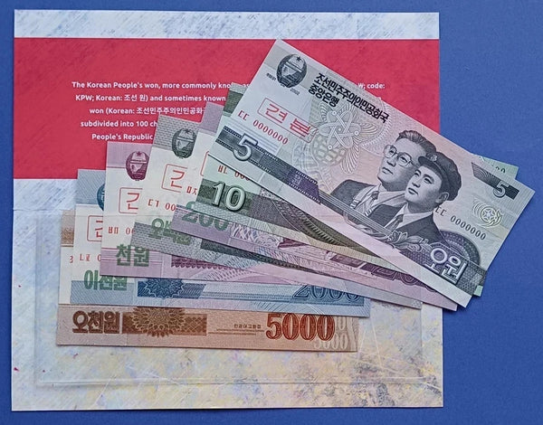 7 different uncirculated specimen notes w/folder, North Korea (DPRK), 2002-13