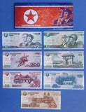 7 different uncirculated specimen notes w/folder, North Korea (DPRK), 2002-13