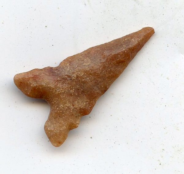 Jasper double notched tidikelt triangle point made out of flint, from  North Africa,  late Neolithic period, ca.3000 BC