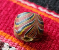 Rare primitive money - glass proto-coin bead, western Sumatra, c.600-1200 AD
