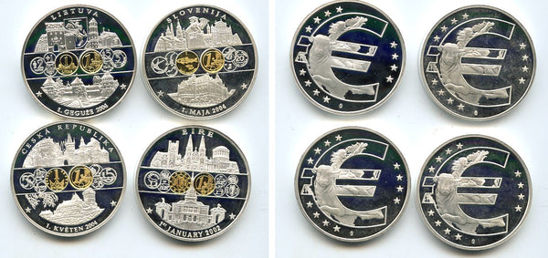 Lot of 4 different medals commemorating the introduction of the Euro coins, dated January 1, 2002.