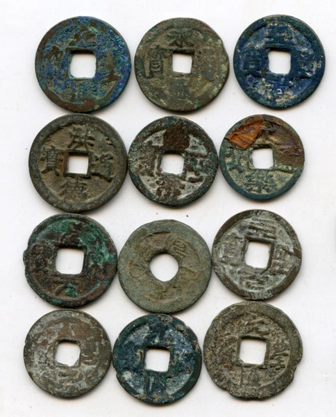 Lot of 12 various ancient and medieval Japanese and Vietnamese coins, 10th-20th century AD