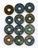 Lot of 12 various ancient and medieval Japanese and Vietnamese coins, 10th-20th century AD